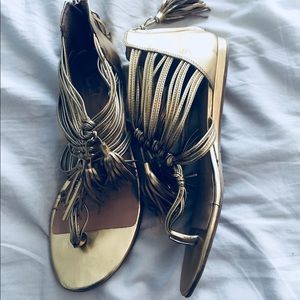 DV BY DOLCE VITA GOLD ROMAN TASSLE SANDALS